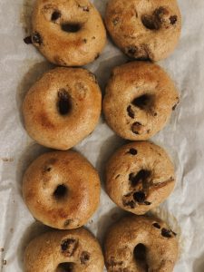 cinnamon raisin sourdough bagels on parchment